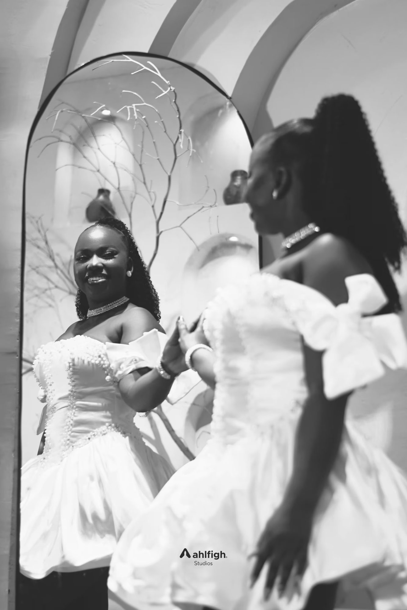 Black and white portrait in a white dress