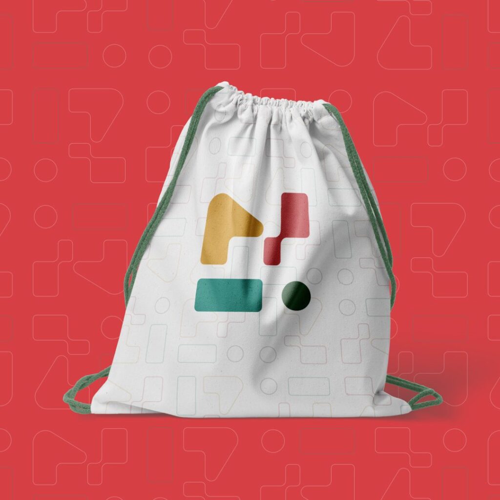 Branded drawstring bag on red