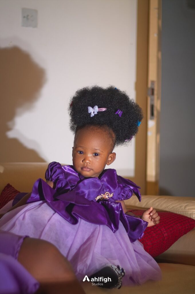Virtue in purple tulle on the sofa