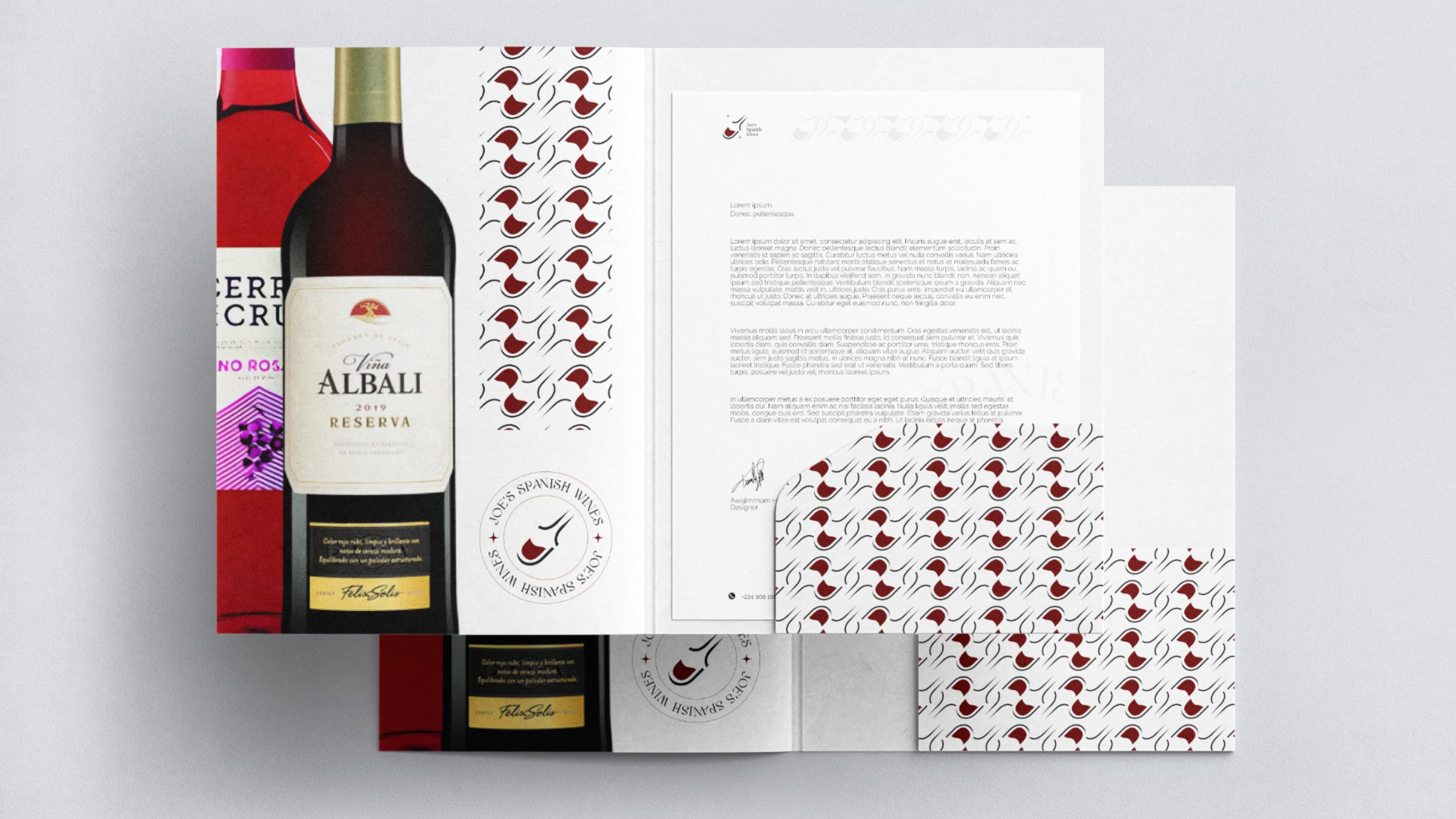 Joe's Spanish Wines stationery and a bottle of Viña Albali beside the patterned folder